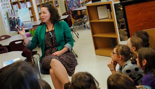 Stock image teacher reading 